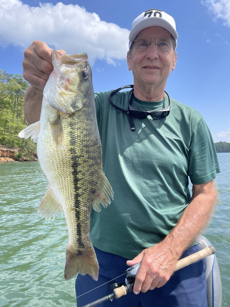Ben, a skilled auto glass technician with over 40 years experience, repairing a windshield chip in Rome, Georgia